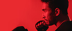 Boxing, fitness and man by mockup space in studio for training, workout or wellness. Banner, sports and male athlete with fighting challenge for cardio exercise, health or practice by red background.