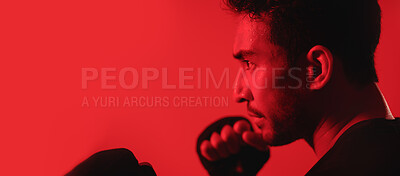 Buy stock photo Boxing, fitness and man by mockup space in studio for training, workout or wellness. Banner, sports and male athlete with fighting challenge for cardio exercise, health or practice by red background.