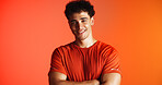 Portrait, fitness and man on studio background with arms crossed, personal trainer job and wellness. Space, confident person and gym coach with workout break, pride and ambition for sports training.