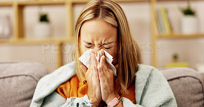 Buy stock photo Sickness, blowing nose and tired with woman on sofa for fatigue, virus infection and flu season. Sinus allergy, disease and sneezing with person and tissue in living room of home for cold and illness