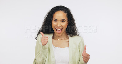 Buy stock photo Student, portrait and woman with thumbs up in studio, knowledge and positive opinion for university. White background, promotion and person with smile for vote, mockup space and education in Brazil