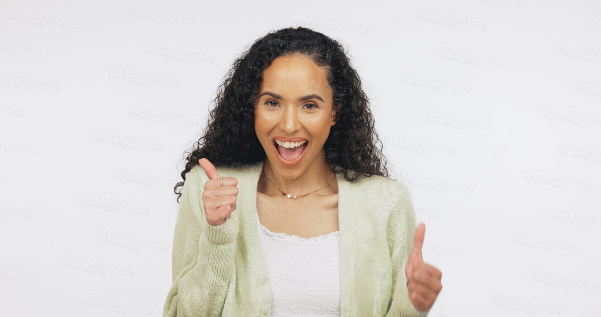 Buy stock photo Student, portrait and woman with thumbs up in studio, knowledge and positive opinion for university. White background, promotion and person with smile for vote, mockup space and education in Brazil