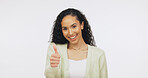 Portrait, vote and happy woman with thumb up in studio, knowledge or positive opinion for university. White background, promotion and person with agreement sign, mockup space and education in Brazil