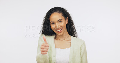 Buy stock photo Portrait, vote and happy woman with thumb up in studio, knowledge or positive opinion for university. White background, promotion and person with agreement sign, mockup space and education in Brazil