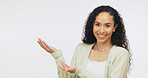 Student, portrait and woman with presentation in studio, smile or recommendation for high education. White background, person and promotion for university funding opportunity, point and mockup space