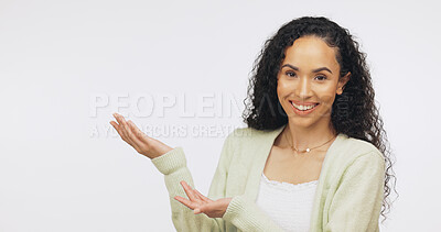 Buy stock photo Student, portrait and woman with presentation in studio, pointing or promotion for higher education. White background, person and advertising for college funding opportunity, happy and mockup space