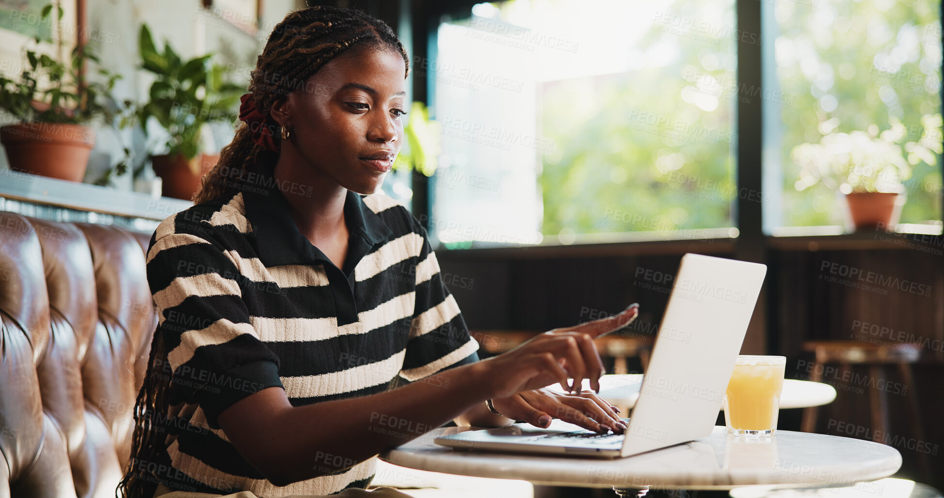 Buy stock photo Creative, online and woman with laptop in cafe, reading and freelance project on web and copywriting. Review, article and black person with tech for campaign, email marketing and remote work in shop