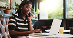 Black woman, laptop and cafe with phone call for conversation, discussion or online chat. Female person, freelancer or journalist talking with mobile smartphone or computer for network in coffee shop
