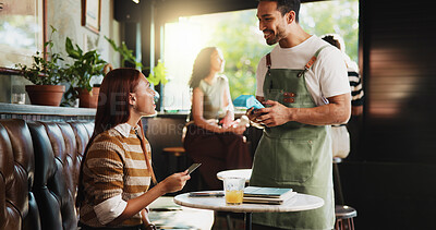 Buy stock photo Woman, credit card and waiter with pos at coffee shop, order and happy customer experience at diner. People, server and smile with easy payment at cafe, fintech or machine with thanks at restaurant