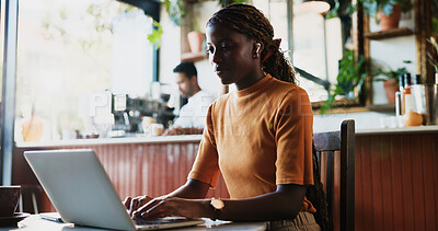 Buy stock photo Woman, student and laptop in coffee shop for studying, assignment review and schedule update. Typing, person and computer in cafe for assessment planning, research and essay draft for submission