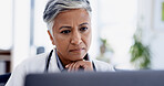 Doctor, thinking and laptop with woman in office for planning, healthcare vision and telehealth query. Medical questionnaire, reflection and treatment idea with mature person in clinic for feedback