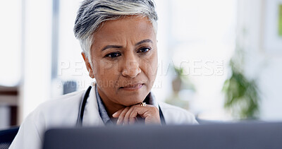 Buy stock photo Doctor, thinking and laptop with woman in office for planning, healthcare vision and telehealth query. Medical questionnaire, reflection and treatment idea with mature person in clinic for feedback