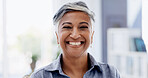 Woman, happy and portrait in office by window with pride, confidence and career at insurance company. Mature person, broker or advisor with smile for risk management services at agency in Mexico