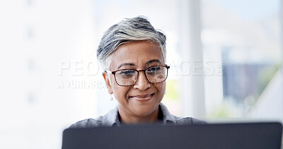 Buy stock photo Reading, online and happy woman with laptop in business, research and financial analysis on website. Office, bookkeeper and mature person with tech for tax preparation, glasses and smile for info