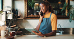 Barista, phone call or woman with tablet in coffee shop for stock order, contact supplier or talking. Tech, cafe and speaking with black person, customer service or inventory update in small business
