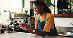 Waitress, smile and woman in cafe with phone, typing text message or notification for online order. Happy, black person and scroll in restaurant with tech, social media or mobile app for hospitality.