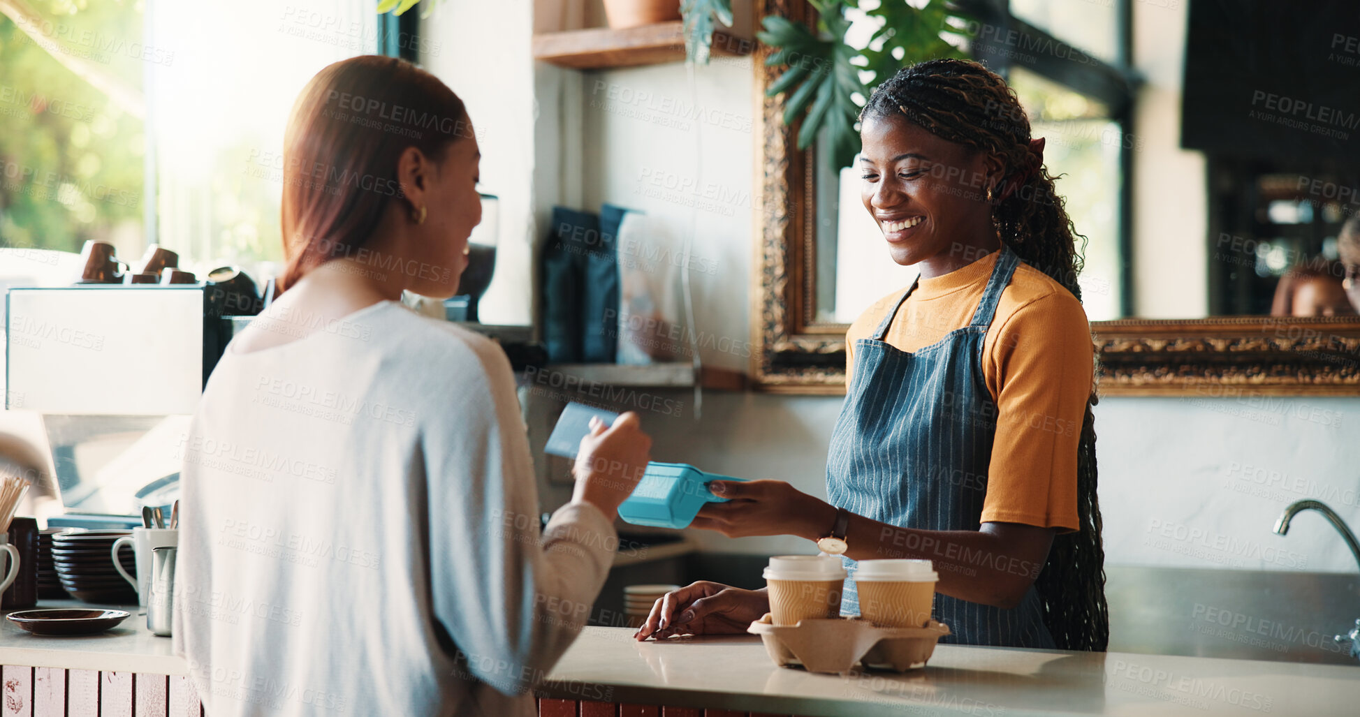 Buy stock photo Happy woman, customer and barista with pos machine for credit card payment or purchase in cafe. Female person, checkout or NFC with debit or smile on counter for order or transaction in coffee shop