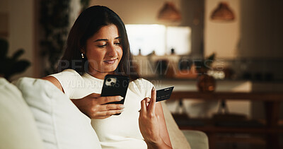Buy stock photo Credit card, phone and relax with woman on sofa for online shopping, digital payment or fintech. Internet banking, account password and customer purchase with person in living room of home for order