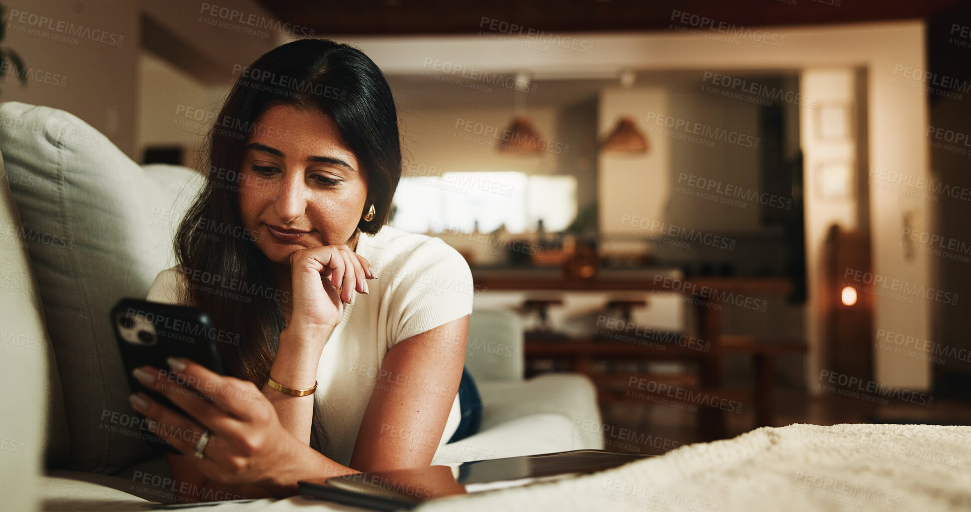 Buy stock photo Phone, relax and reading with woman on sofa in home for communication, social media and contact. Virtual chat, connection and networking app with person in apartment for news, update and post