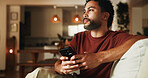 Phone, relax and thinking with man on sofa in home for communication, social media and contact. Virtual chat, connection and networking app with person in apartment for news, update and idea