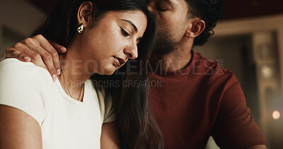 Buy stock photo Kiss, couple and sad woman with comfort in home, compassion and emotional security for understanding. Empathy, unhappy person and partner with affection for support, console and love for relationship