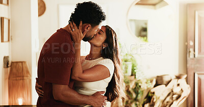 Buy stock photo Couple, love and kiss in home with romantic connection, loyalty and bonding together for relationship. People, affection and care in house with trust, soulmate and partner for marriage commitment.