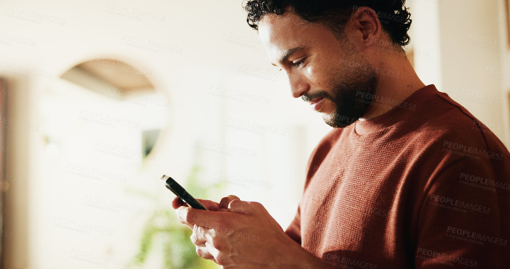 Buy stock photo Phone, relax and reading with man in home for communication, social media and contact. Virtual chat, connection and networking app with male person in apartment for news, update and online post