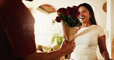 Buy stock photo Love, couple and surprise with flowers in home for anniversary celebration, valentines day or care. Man, woman and rose bouquet in house for romantic gift, commitment and excited for floral present