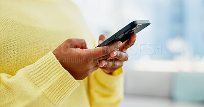 Buy stock photo Scroll, online and hands with phone in home, typing and chat with contact on social media in lounge. Browsing, website and texting with mobile app in living room, post and message with tech in house