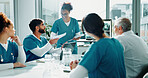 Documents, nurses and meeting in hospital for healthcare, surgery schedule or radiology review. Paperwork, medical team or happy people planning for discussion, x ray update or report with laptop