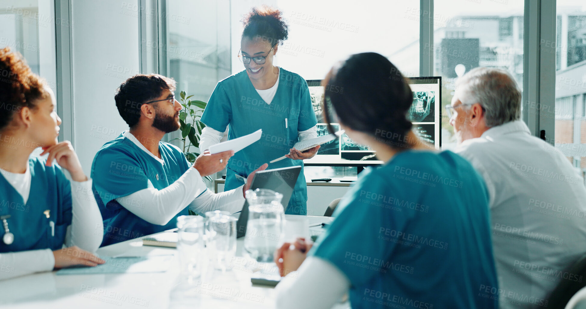 Buy stock photo Documents, nurses and meeting in hospital for healthcare, surgery schedule or radiology review. Paperwork, medical team or happy people planning for discussion, x ray update or report with laptop
