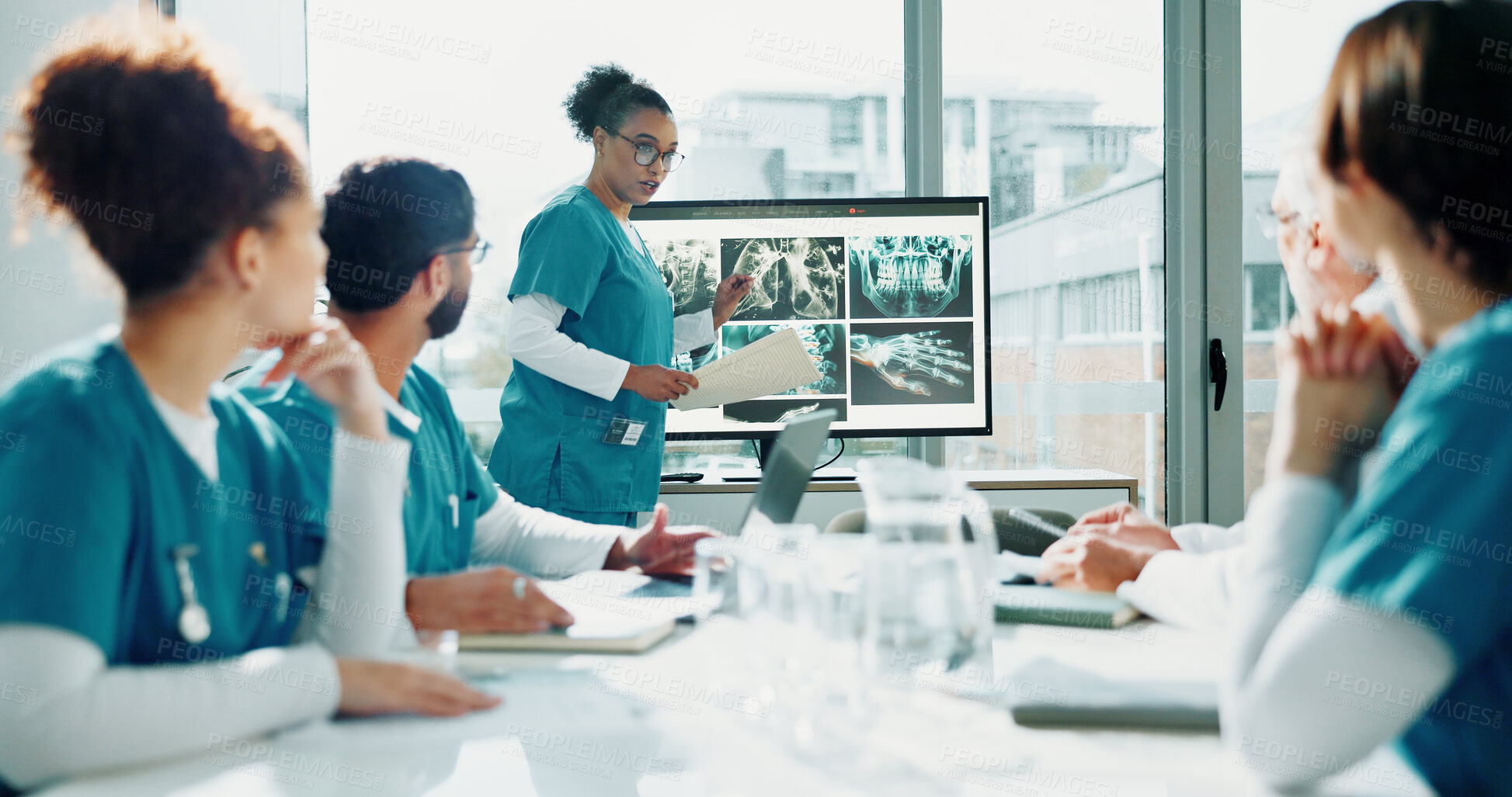 Buy stock photo Presentation, doctors or woman with xray on screen, explain research or breakthrough imaging tech. Healthcare, education or people with workshop for medical scan innovation, speaking or learning