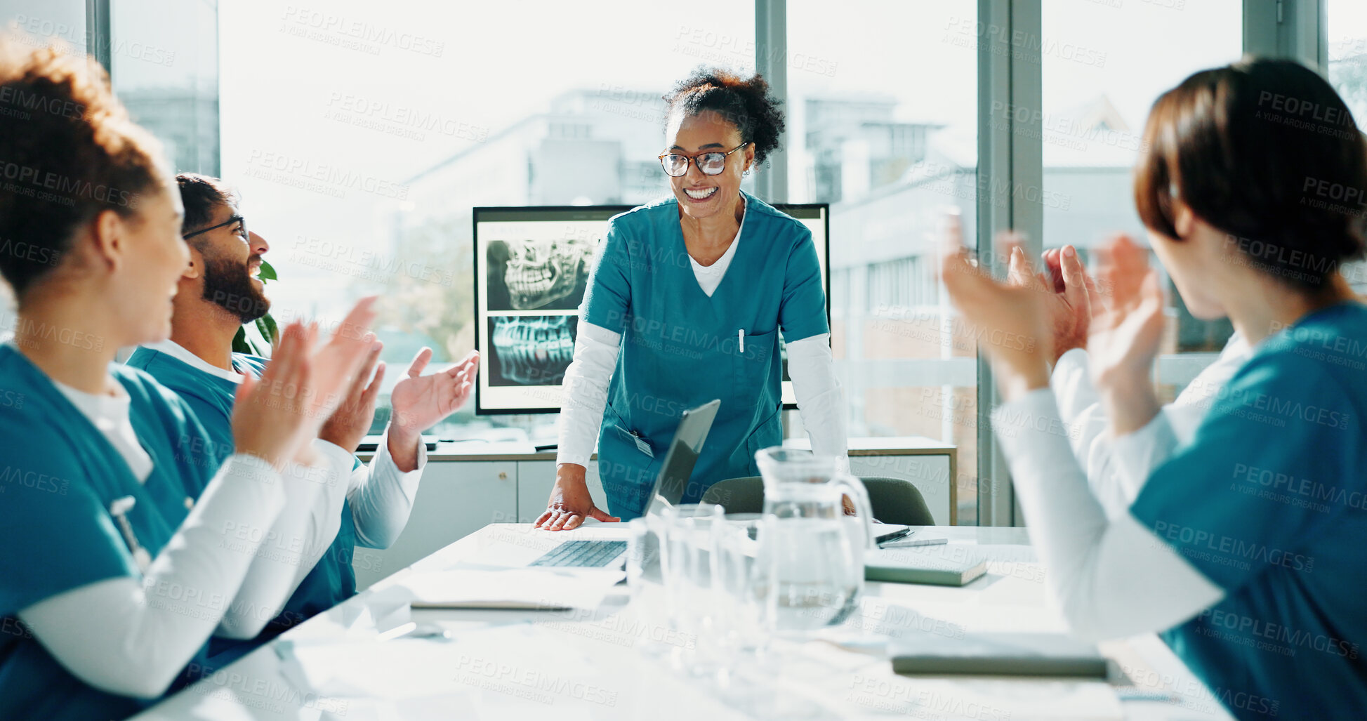 Buy stock photo Applause, doctors or woman with presentation in boardroom, appreciation or medical resident training. Clap, recognition or surgeon with healthcare students for surgery workshop, praise or education