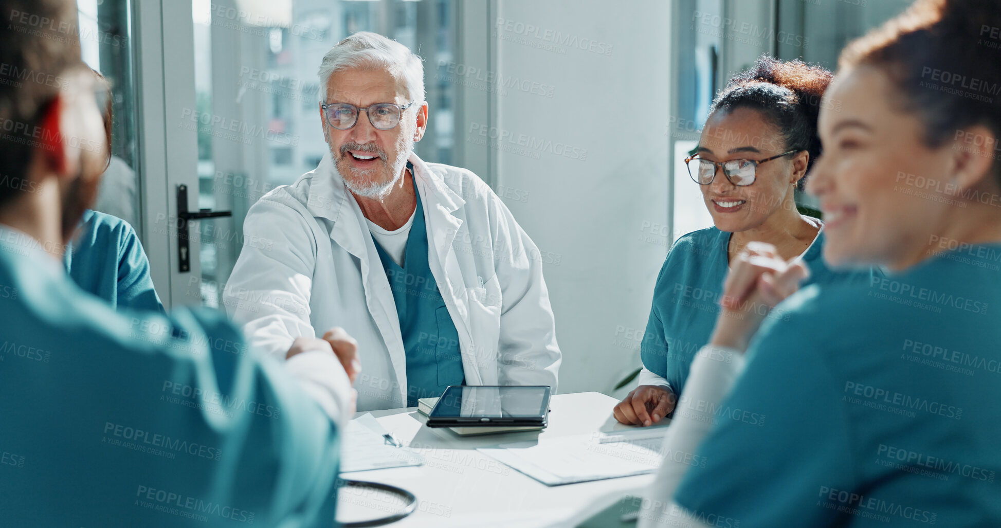 Buy stock photo Happy people, doctor and handshake with nurse in meeting for onboarding medical procedure. Group, healthcare workers or team shaking hands with agreement or deal for clinic partnership in hospital