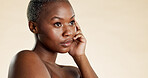Thinking, serious and black woman with skincare in studio background for vision, beauty and shine. Mockup space, female person and decision for healthy skin, cosmetic and dermatology for natural glow
