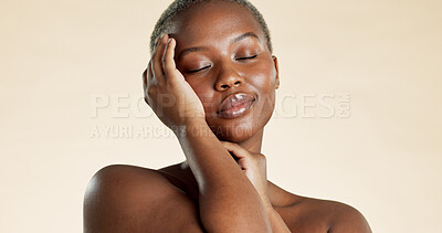 Buy stock photo Confident, black woman and beauty with skincare in studio background for shine, cosmetics and self care. Space, female person and eyes closed with healthy skin, facial dermatology and natural glow