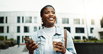 Buy stock photo Coffee, business and black woman in city with earphones for music, thinking and morning commute. Happy, travel and person walking with cellphone for streaming audio, podcast and playlist in town