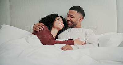 Buy stock photo Relax, cuddle and couple with smile in bed on weekend, romantic morning and conversation for bonding. Love, support and happy people with hug for emotional connection, care and chat in home together