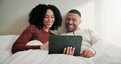 Buy stock photo Relax, smile and couple in bedroom, tablet for entertainment and online reading for morning news. Happy, man and woman in home, love and tech for social media, subscription and website info for film