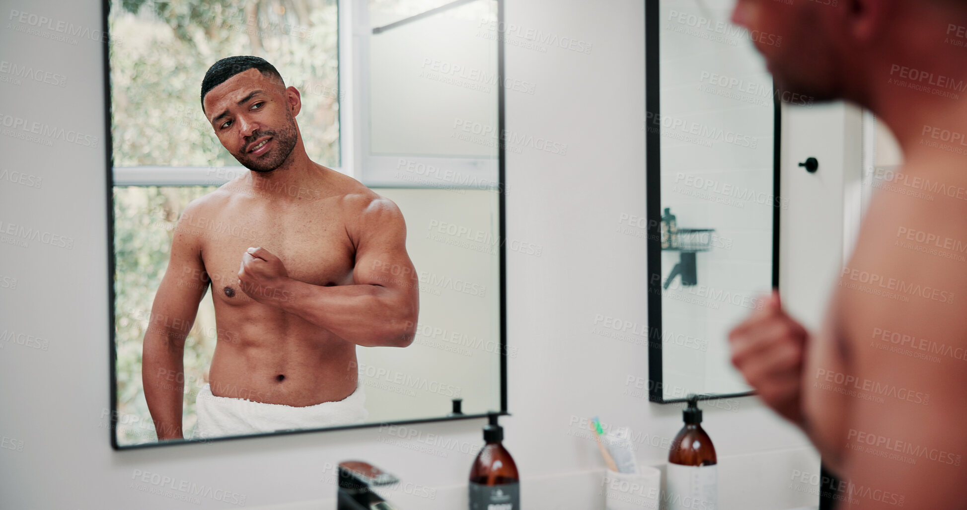 Buy stock photo Mirror, flexing and man in bathroom, fitness and confident for muscle growth and bodybuilding. Bodybuilder, reflection and person with pride for bicep development, grooming or morning routine in home
