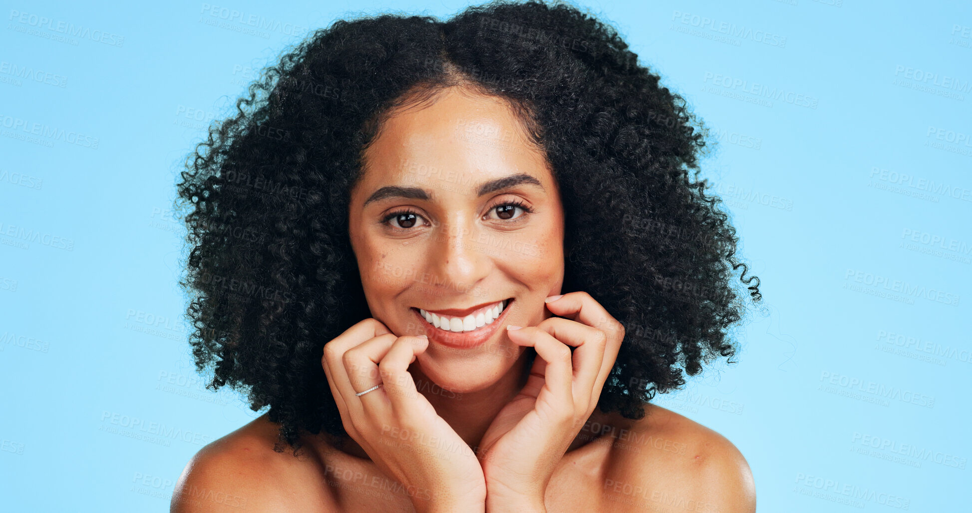 Buy stock photo Skincare, happy or woman in studio with portrait, shine or soft touch in facial care. Wellness, smile or female person on blue background with confidence, dermatology or glow with for smooth skin.