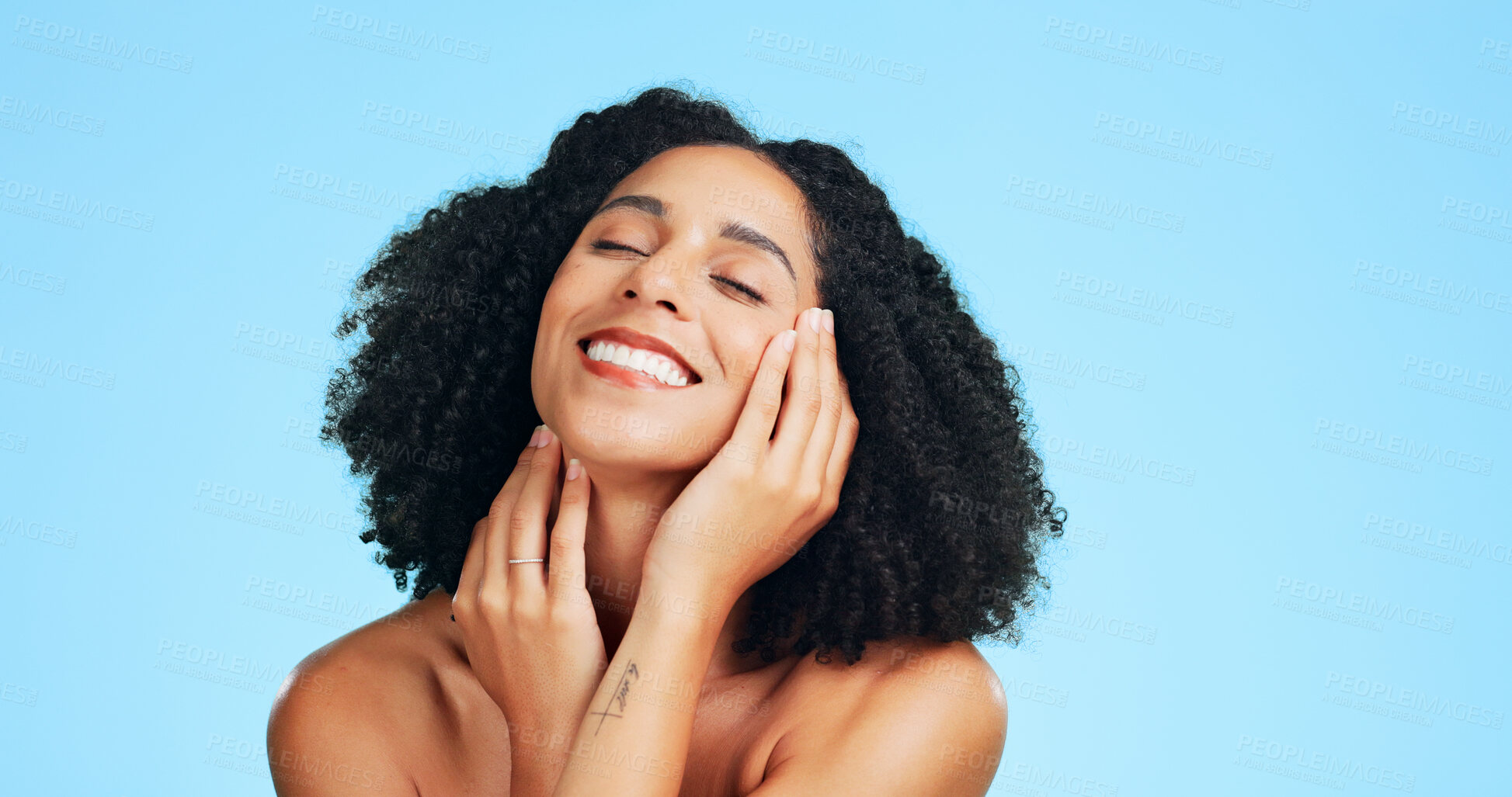 Buy stock photo Happy, beauty and woman in studio with skincare for makeover, cosmetics and aesthetic for shine. Cosmetology, space and person smile with makeup, facial treatment and grooming on blue background