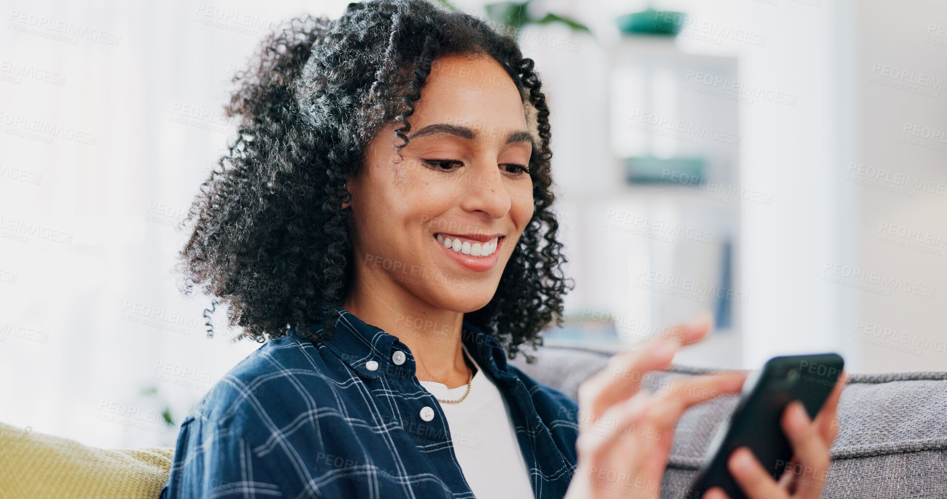 Buy stock photo Laugh, texting and woman on couch with phone, online communication and comic post on social media. Happy, digital and female person in house with tech, funny message or meme reaction on chat app.