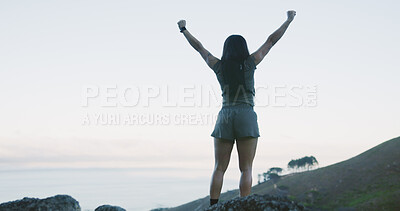 Buy stock photo Hike, back and woman on cliff with arms up, cardio goal or celebration in fitness activity. Training, space or person on mountain with victory, achievement and milestone reach in outdoor trekking.