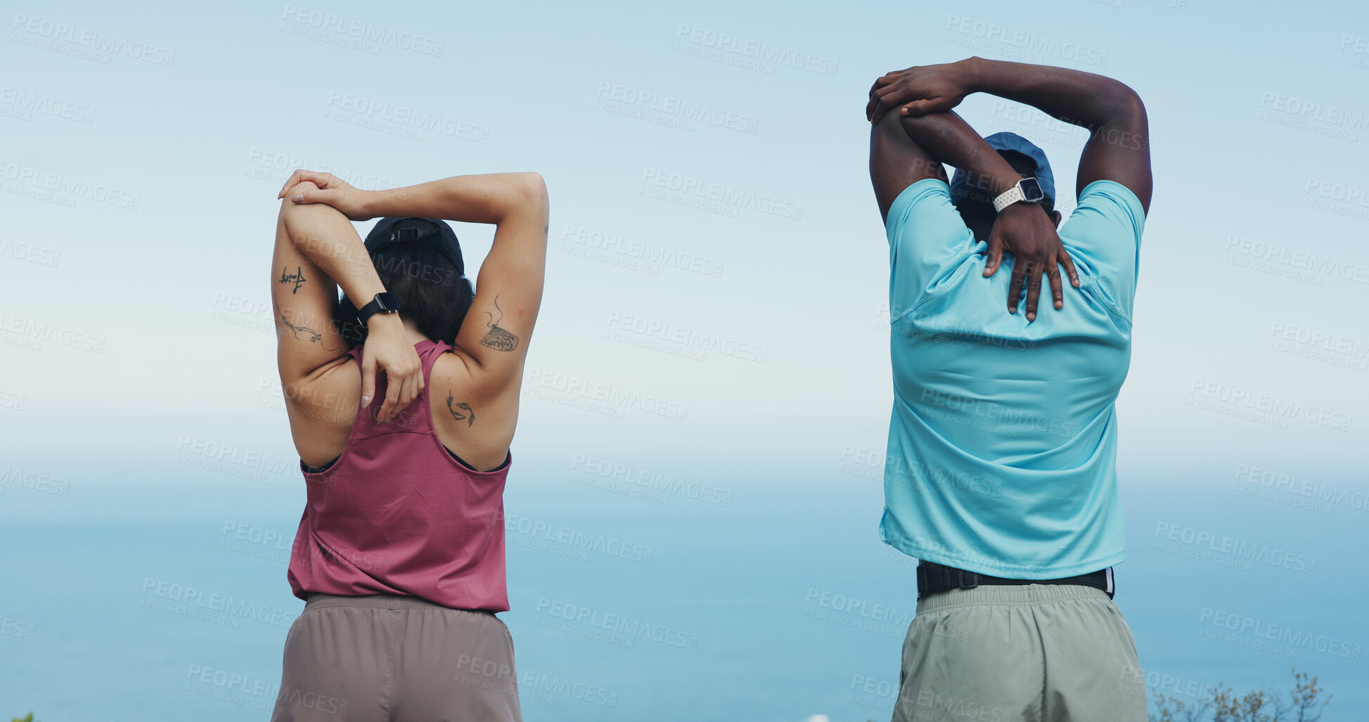 Buy stock photo People, fitness and stretching with arms for workout preparation or outdoor exercise in nature. Back view, active or interracial couple getting ready with body warm up or blue sky for training