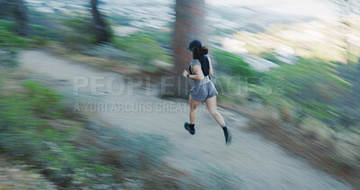 Buy stock photo Exercise, woman and running in forest with motion blur, body wellness and cardio endurance with speed. Person, outdoor and fast runner in woods from above for fitness, training practice and back
