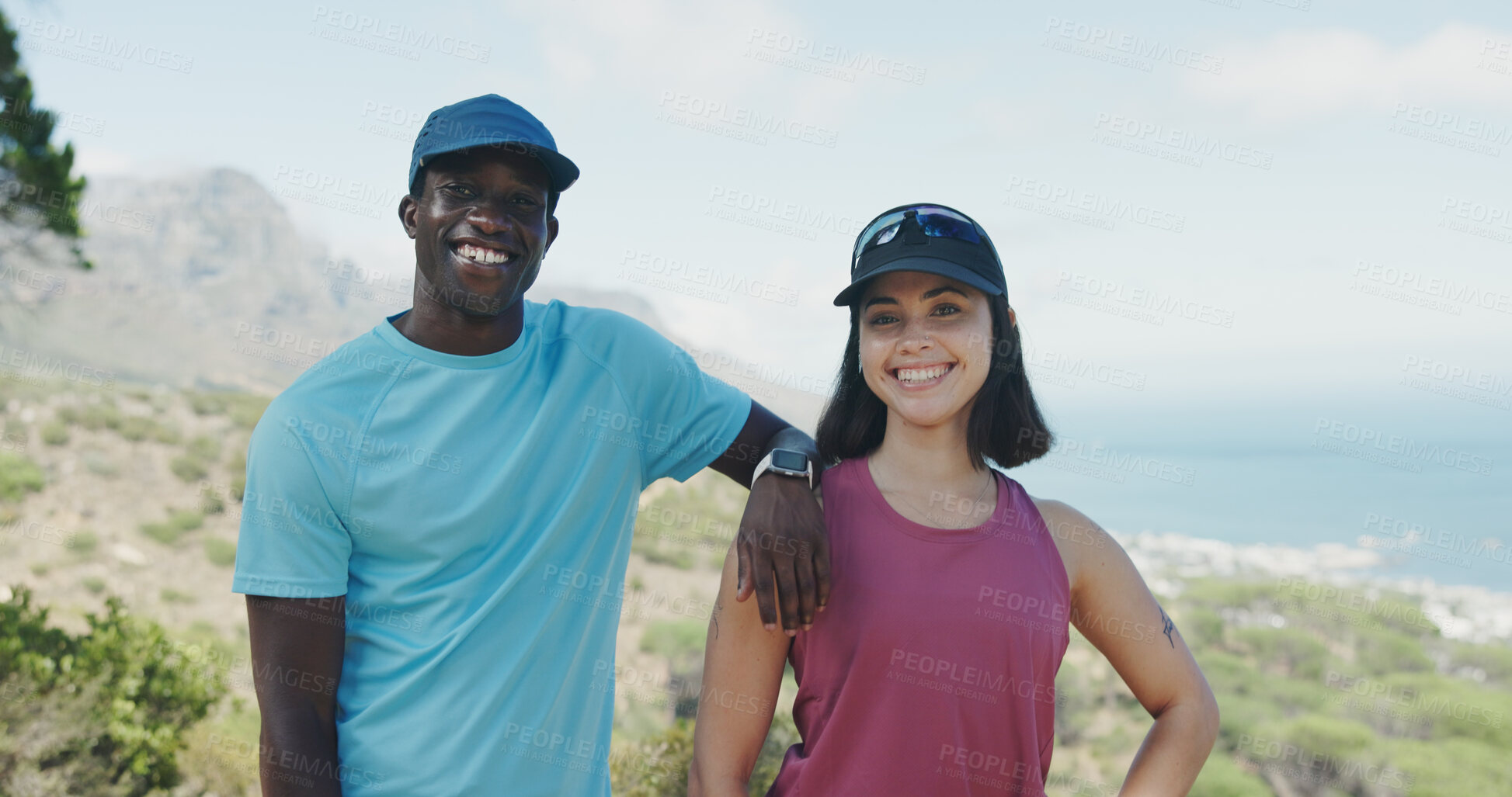 Buy stock photo Portrait, hiking and interracial couple with smile for fitness, trekking or adventure on mountain. Outdoor, hiker or people with view for travel, exercise or holiday and explore nature with blue sky