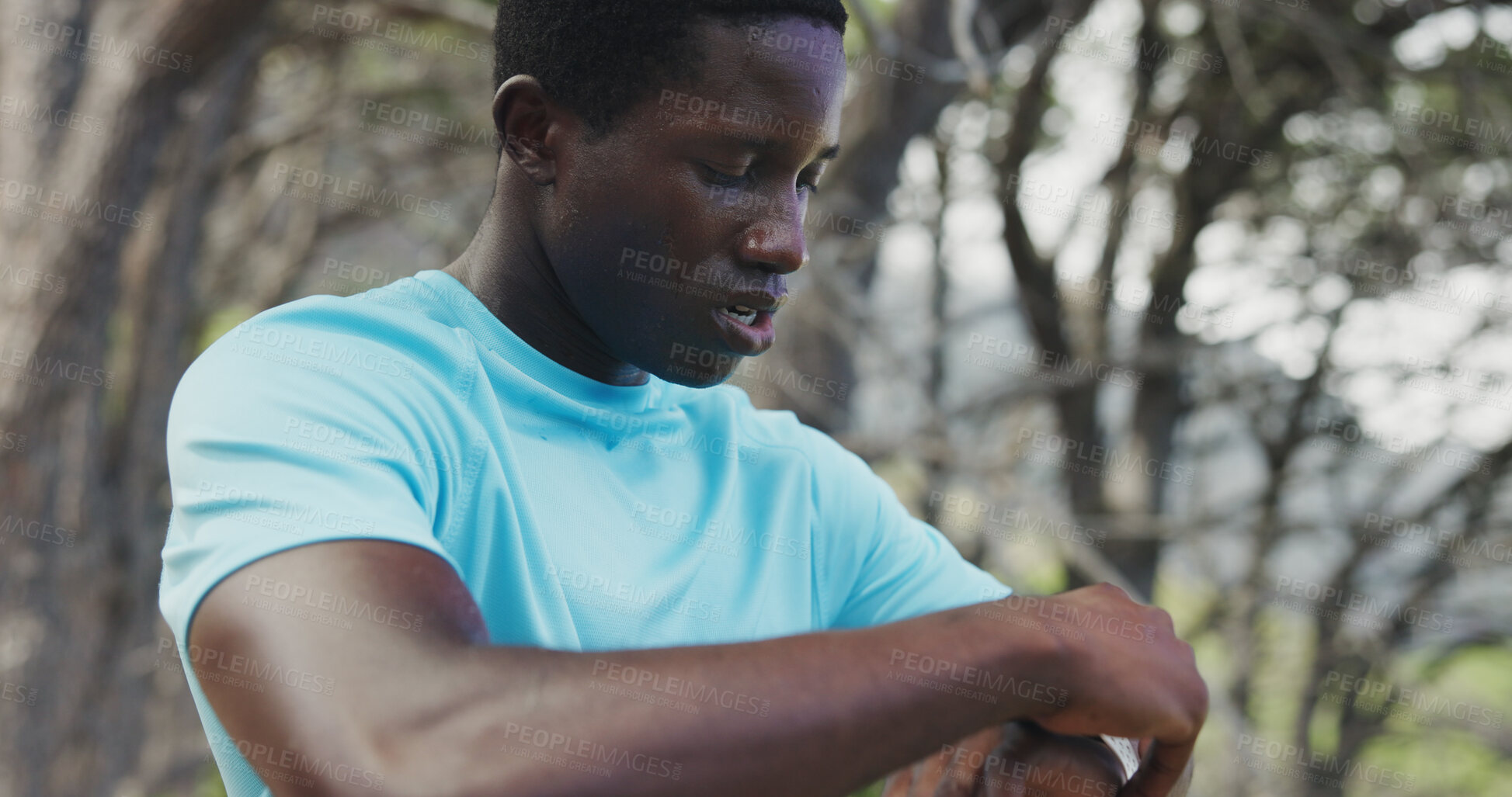 Buy stock photo Fitness, tired and man with smart watch outdoor to check cardio pace, monitor heart rate and sweat. Athlete, black person and workout timer in nature for sports performance, recovery time and resting