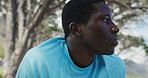 Fitness, break or black man in nature with challenge, cardio fatigue or rest in outdoor practice. Exercise, dedication or runner in forest with sweat, training pause or recovery for performance goals