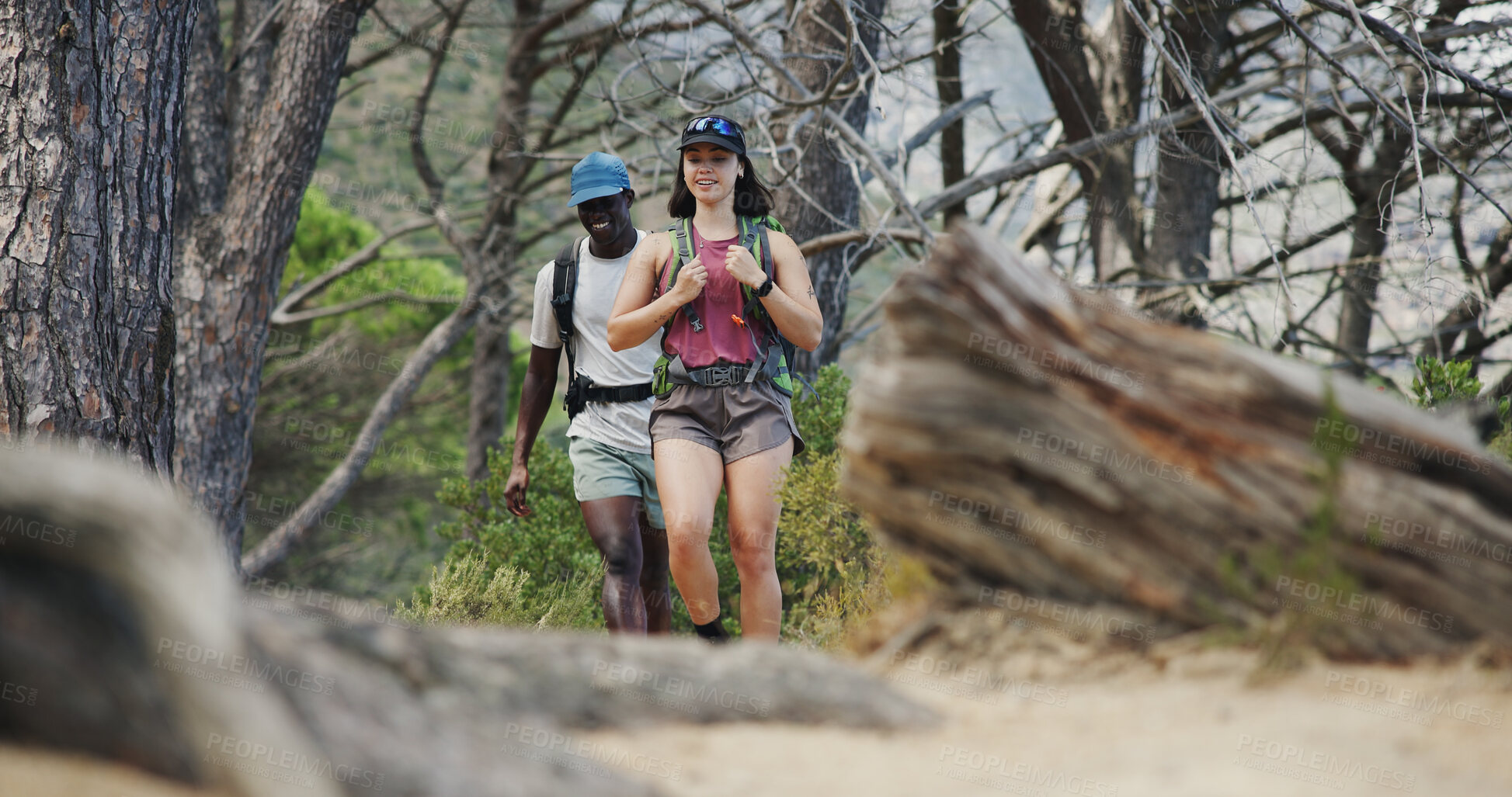 Buy stock photo Fitness, hiking or couple in forest with walk, partnership or cardio support in physical activity. Team, man or woman outdoor with exercise, workout collaboration or trekking together in nature hobby